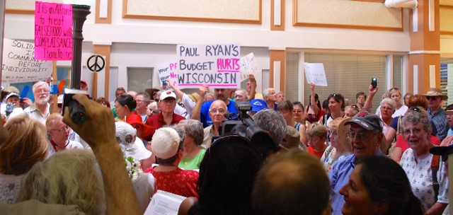 Supporters and protestors outside Rep. Paul Ryan's office. 